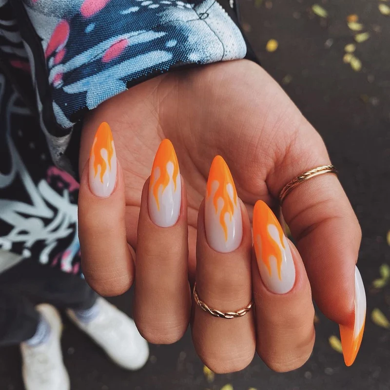Artful nail extensions with an elegant leaf pattern Stornfield