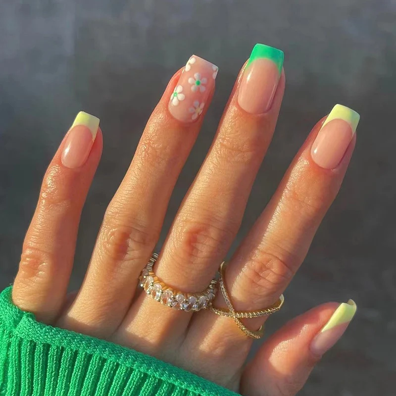 Artful nail extensions with an elegant leaf pattern Stornfield