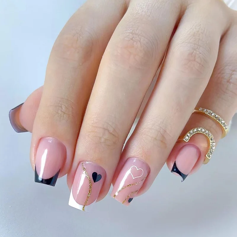 Artful nail extensions with an elegant leaf pattern Stornfield