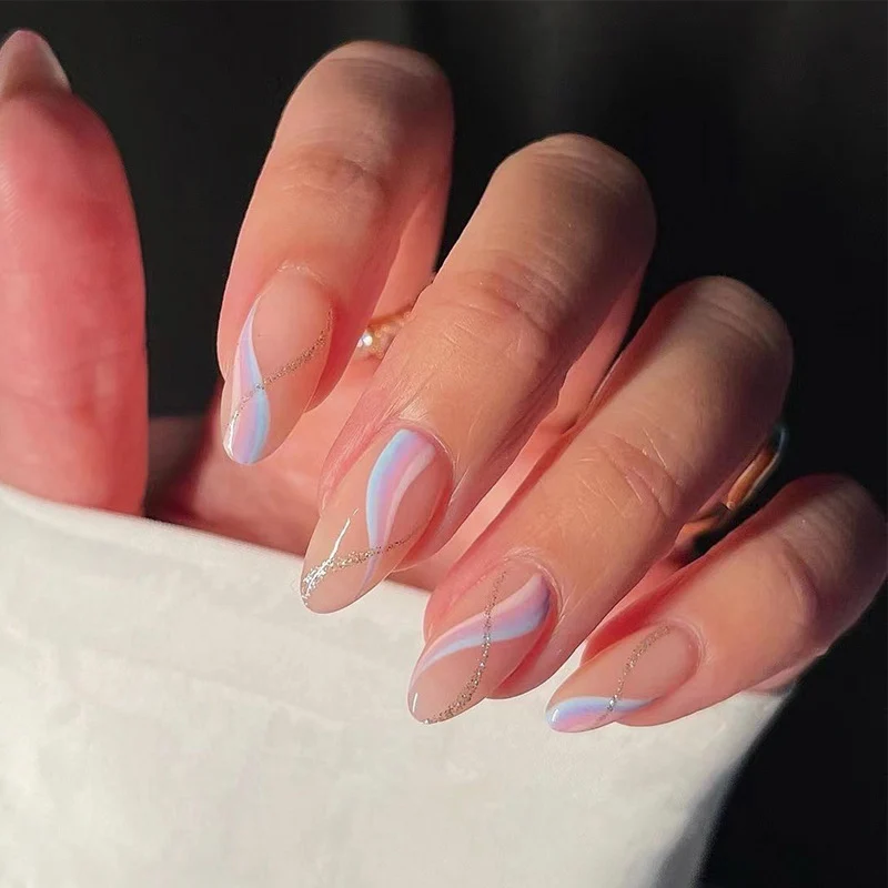Artful nail extensions with an elegant leaf pattern Stornfield