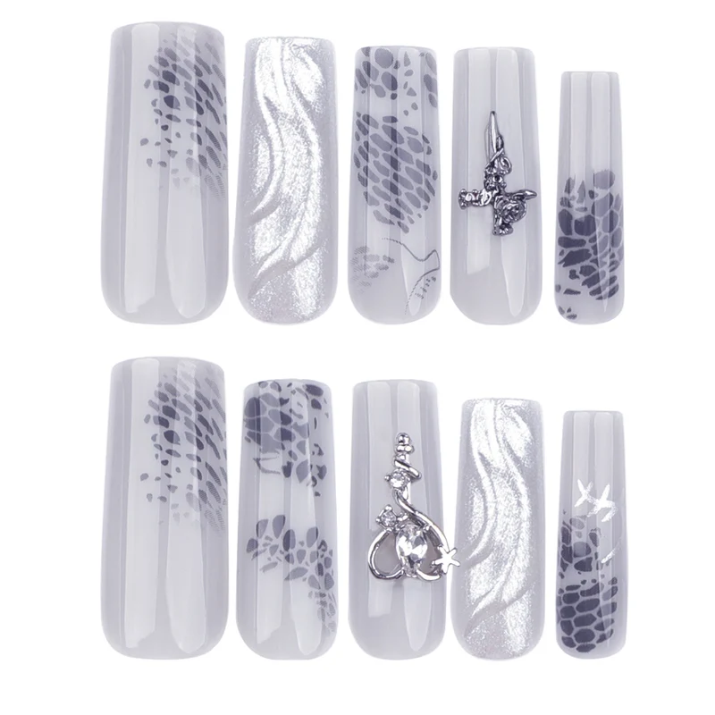 Artful Nail Extensions with Noble Accents Stornfield