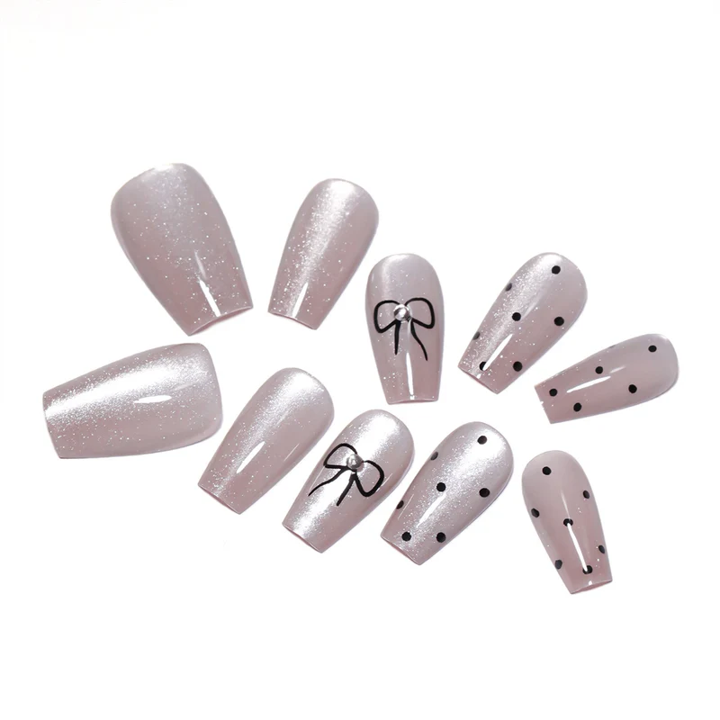 Artful Nail Extensions with Colorful Bow Motifs Stornfield