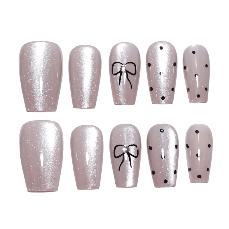 Artful Nail Extensions with Colorful Bow Motifs Stornfield
