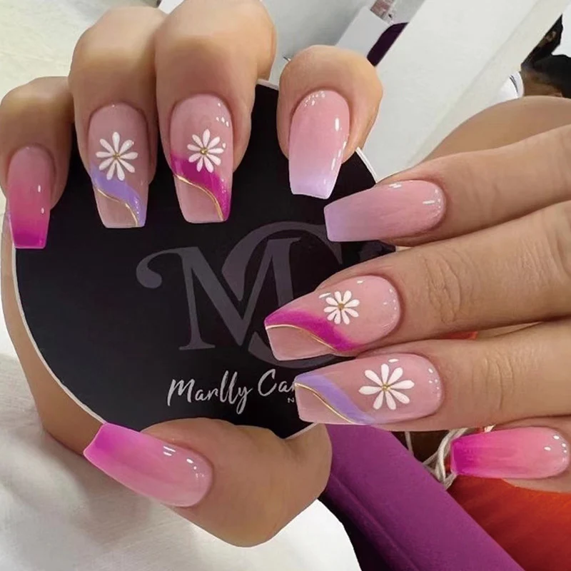 Artful nail extensions with colorful ombre design and floral accents Stornfield