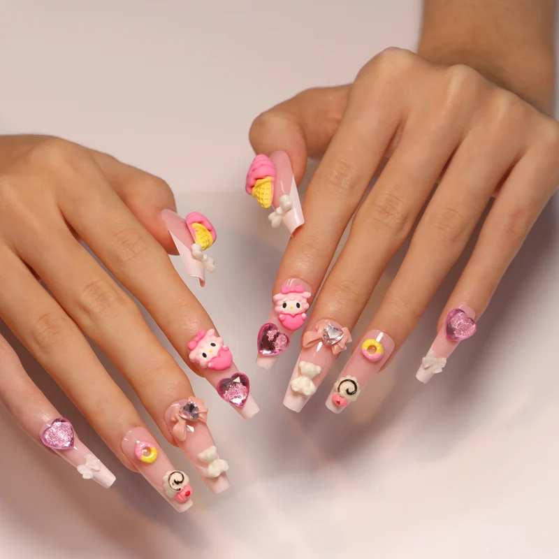 Artful nail extensions with 3D dessert motif Stornfield