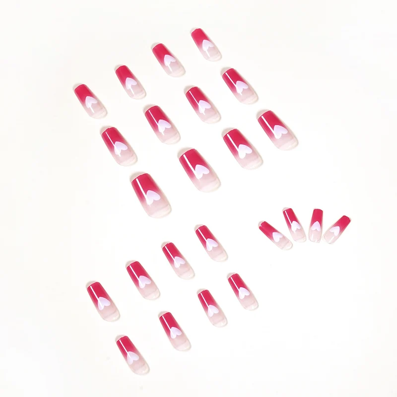 Artful nail extensions in romantic heart design Stornfield
