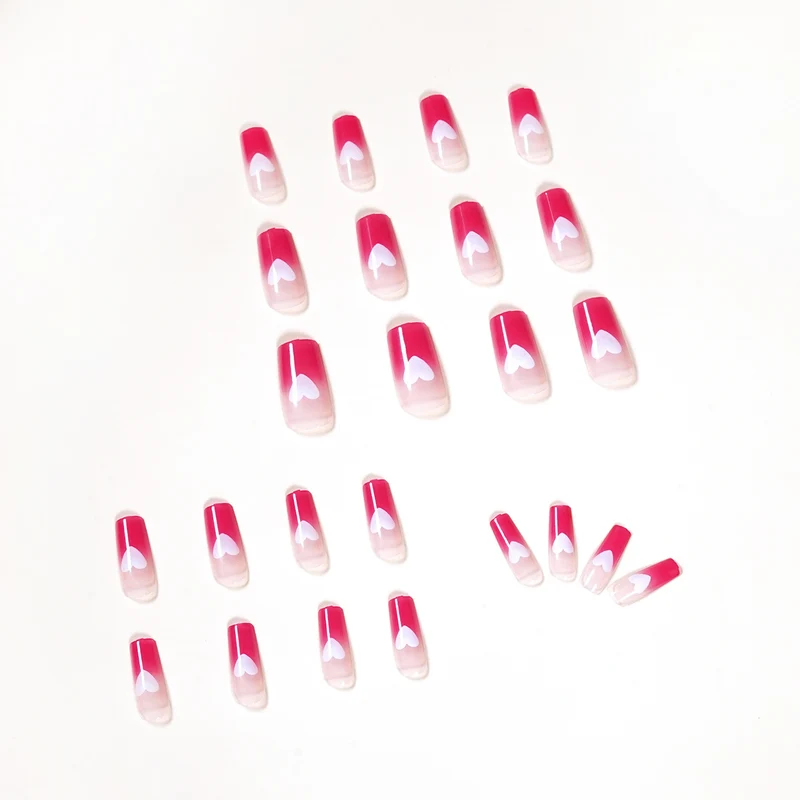 Artful nail extensions in romantic heart design Stornfield