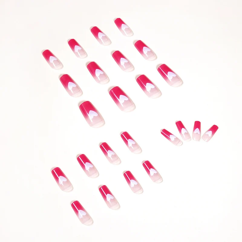 Artful nail extensions in romantic heart design Stornfield