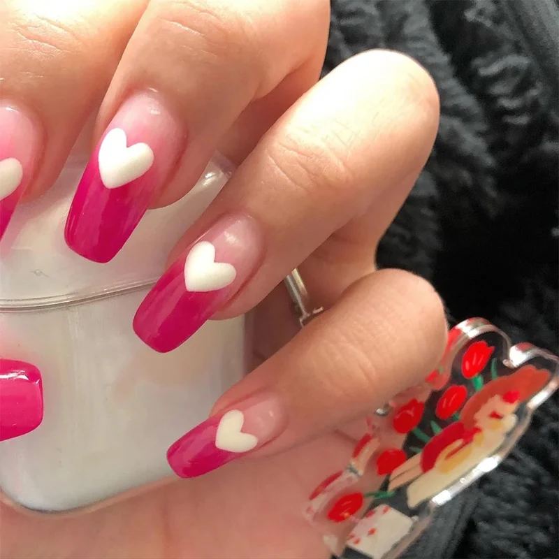 Artful nail extensions in romantic heart design Stornfield