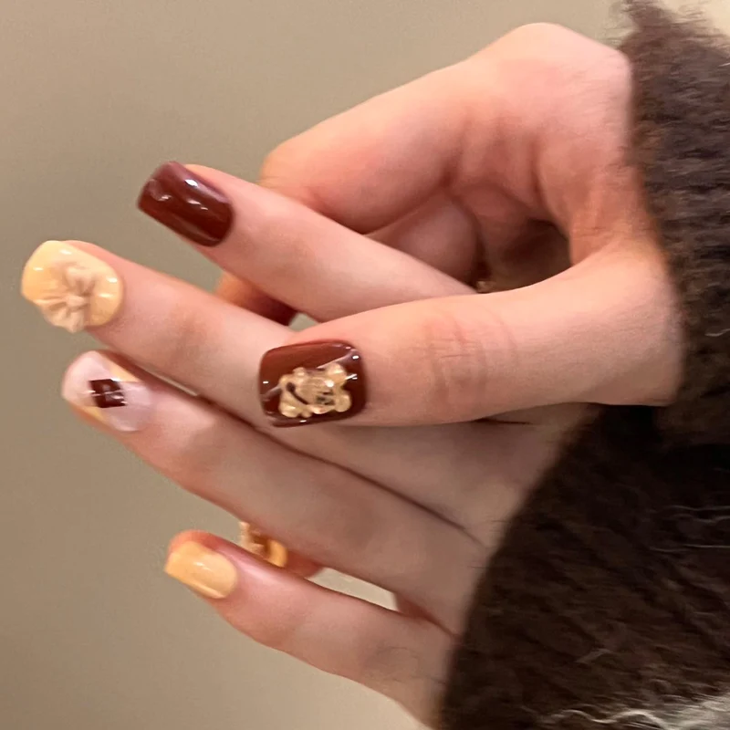 Artful nail extensions in modern design with flower accents Stornfield