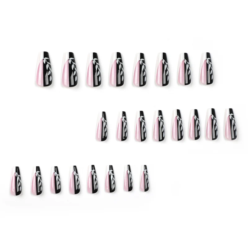 Artful nail extensions in elegant black and white design Stornfield