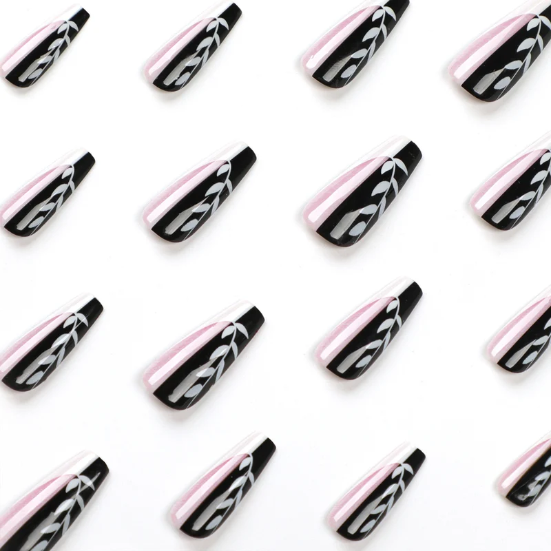 Artful nail extensions in elegant black and white design Stornfield