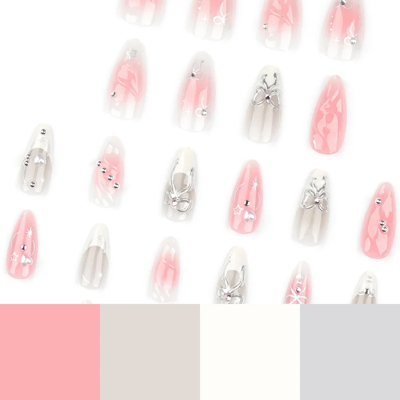 Artistic Nail Tips with Glitter and Bow Motifs Stornfield