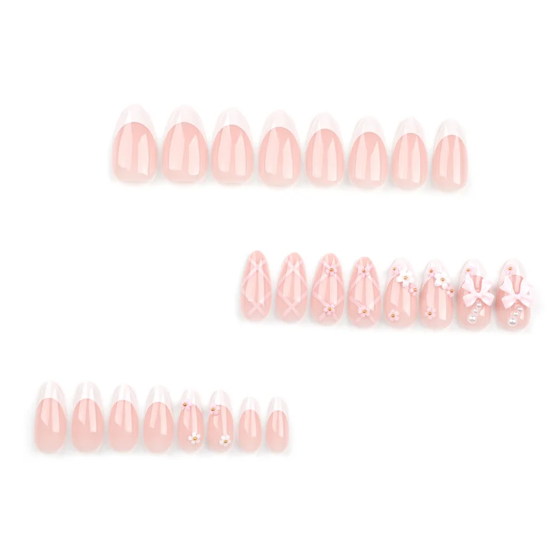 Artful nail art with delicate bows and floral accents Stornfield