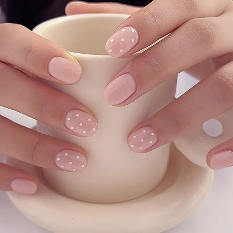 Artful Nail Art with Delicate Dot Design Stornfield