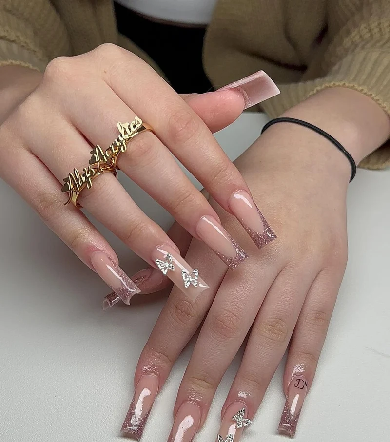 Ornate Butterfly-Inspired Acrylic Nail Extensions Stornfield