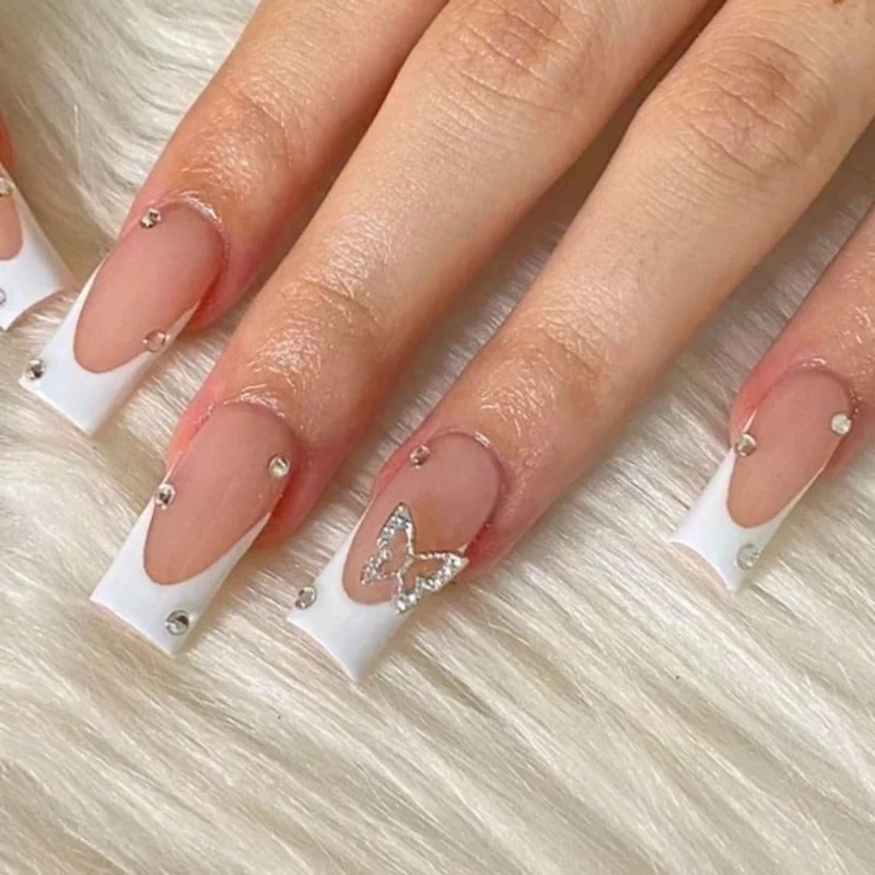 Elegant Stiletto Nail Extensions with Rhinestone Accents Stornfield