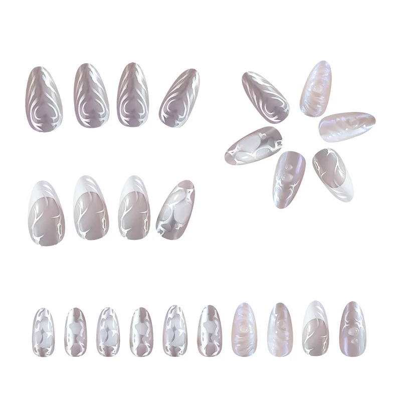 Elegant Stiletto Nail Extensions with Decorative Silver Accents Stornfield