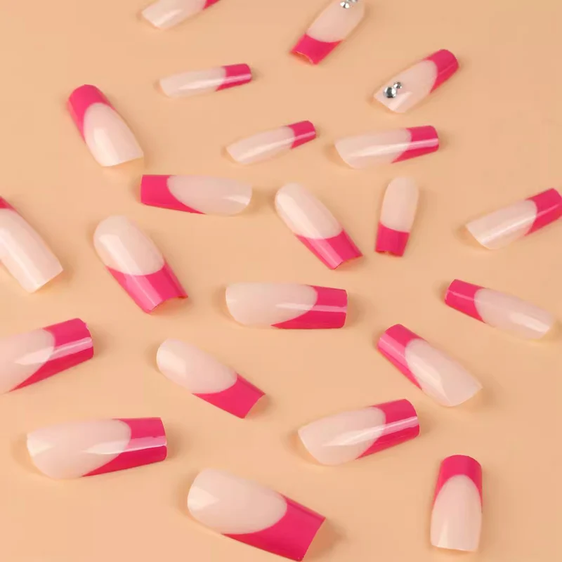 Elegant Almond-Shaped Nail Extensions with Rhinestone Accents Stornfield