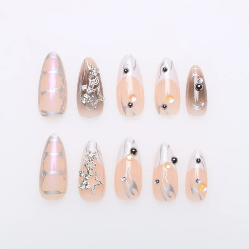 Artistic Stiletto Nail Extensions with Metallic Accents Stornfield