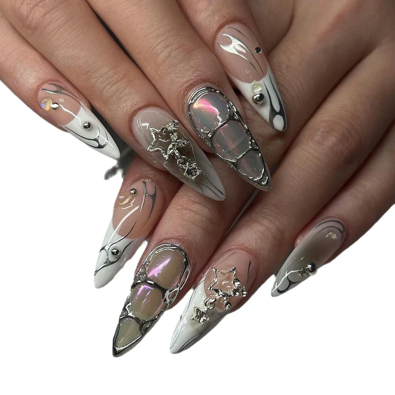 Artistic Stiletto Nail Extensions with Metallic Accents Stornfield