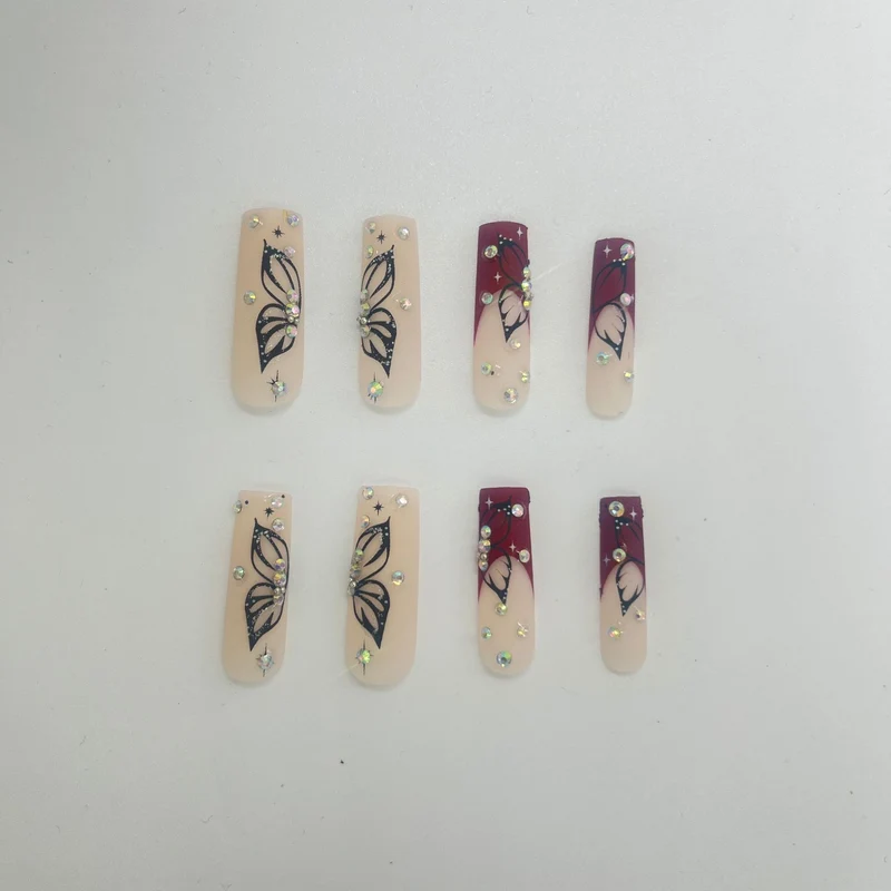 Artistic Long Nail Extensions with Butterfly Design Stornfield
