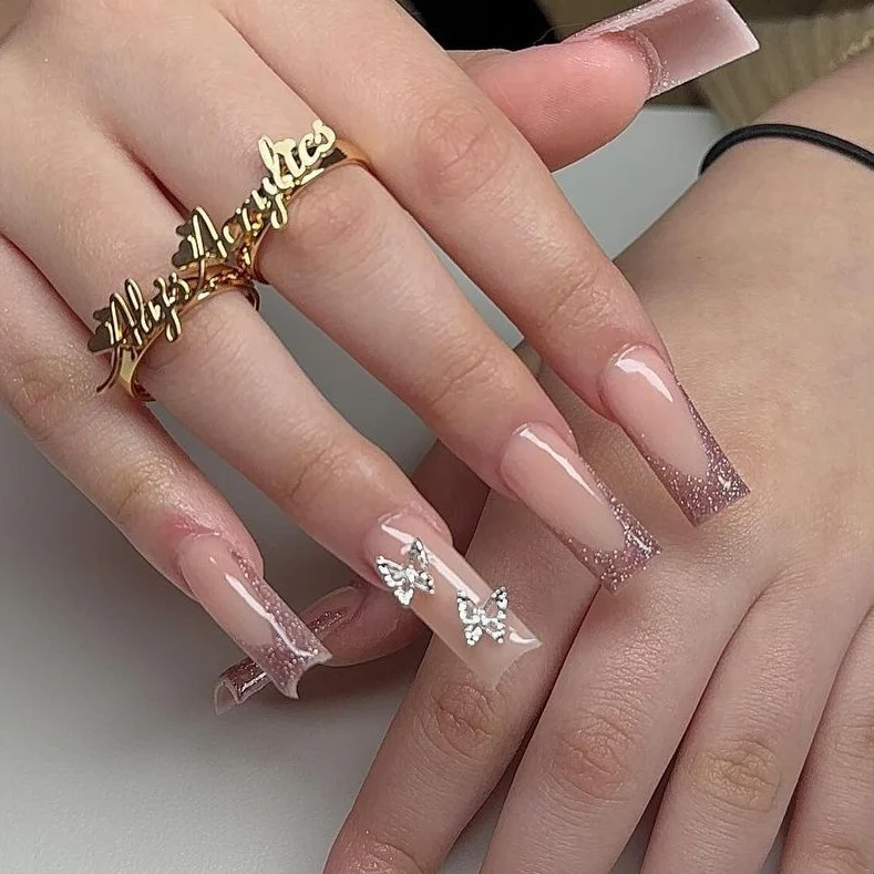 Artistic Long Glossy Almond-Shaped Nail Extensions Stornfield
