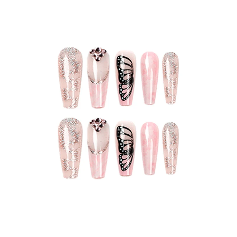 Glamorous nail extensions with beautiful butterfly motifs and glitter accents Stornfield