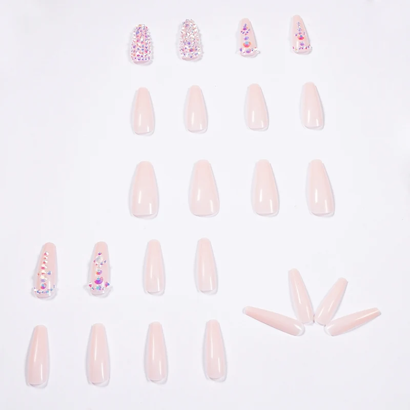 Glamorous nail extensions with rhinestone accents Stornfield