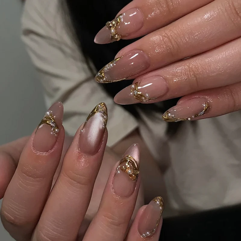 Glamorous nail art with gold accents Stornfield