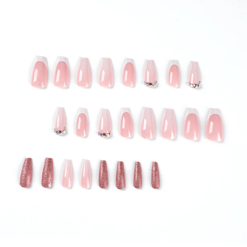 Glamorous artificial nails with rhinestone accents Stornfield