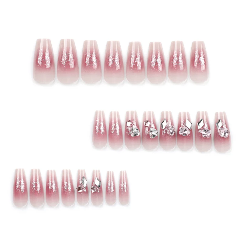 Glamorous artificial nails with glitter and crystal embellishment Stornfield
