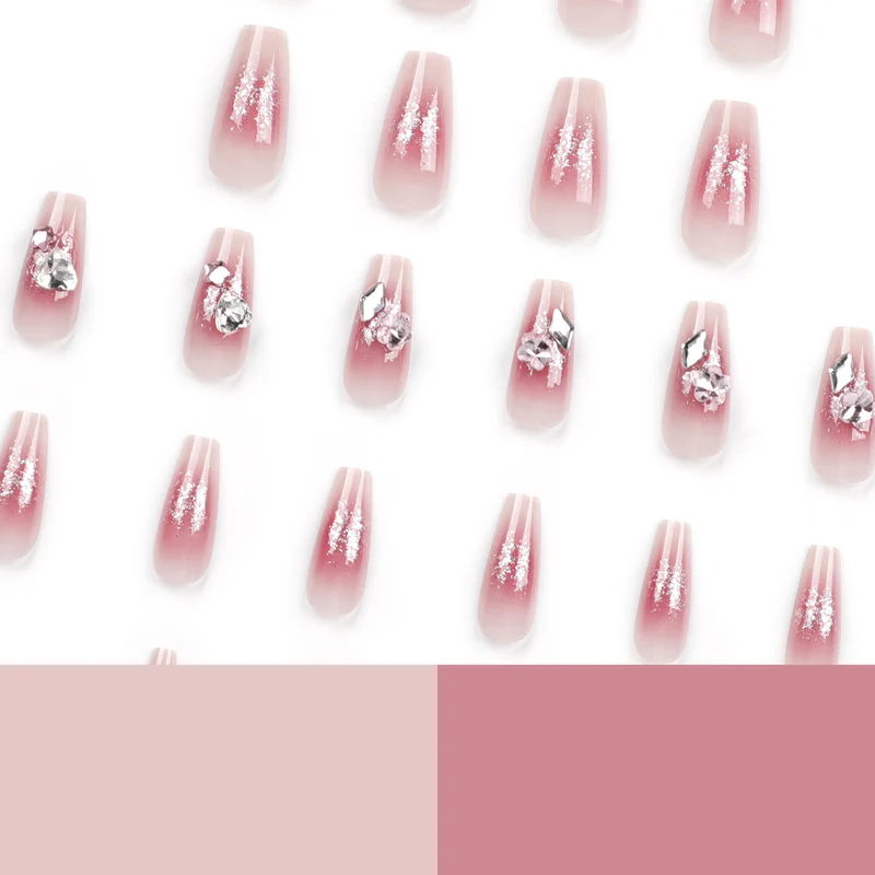 Glamorous artificial nails with glitter and crystal embellishment Stornfield