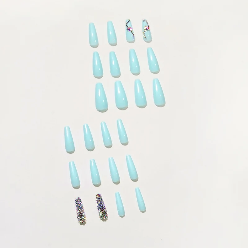 Glamorous artificial nails with sparkling rhinestone embellishments Stornfield