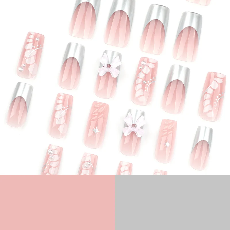 Glamorous artificial nails with elegant decorations Stornfield