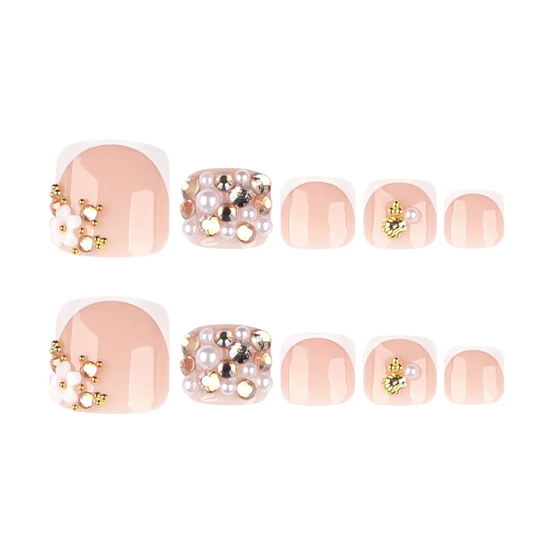 Glamorous toenail art with luxurious rhinestone and floral designs Stornfield