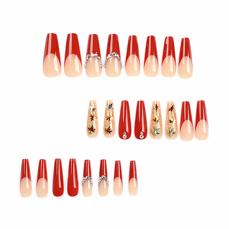 Glamorous acrylic nails with leaf design and glitter accents Stornfield