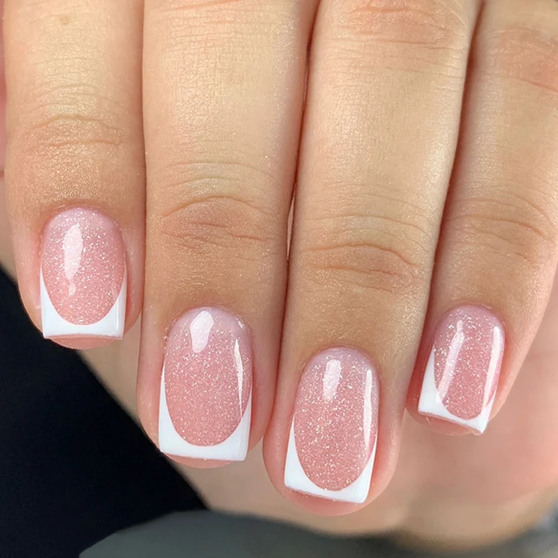 Sparkling nail art with elegant French tip design Stornfield