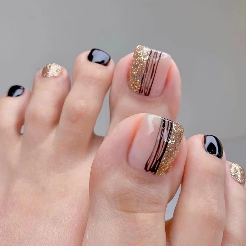 Exquisite toenail art with glitter and stripe design Stornfield