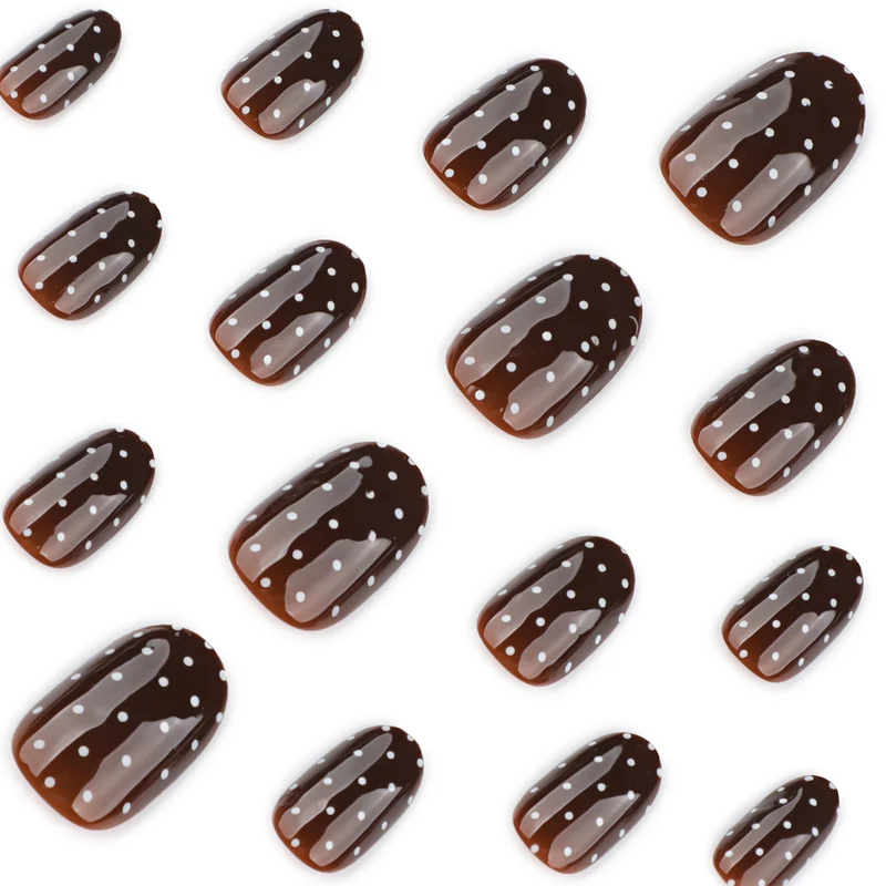 Elegant and modern nail art with polka dots Stornfield