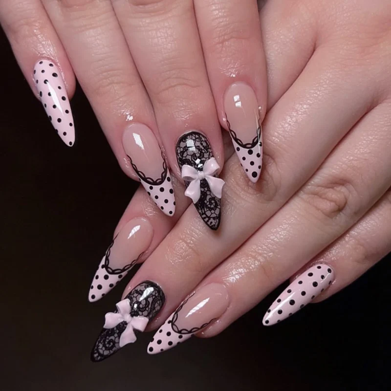 Elegant and artistic stiletto nails with tips and bows Stornfield