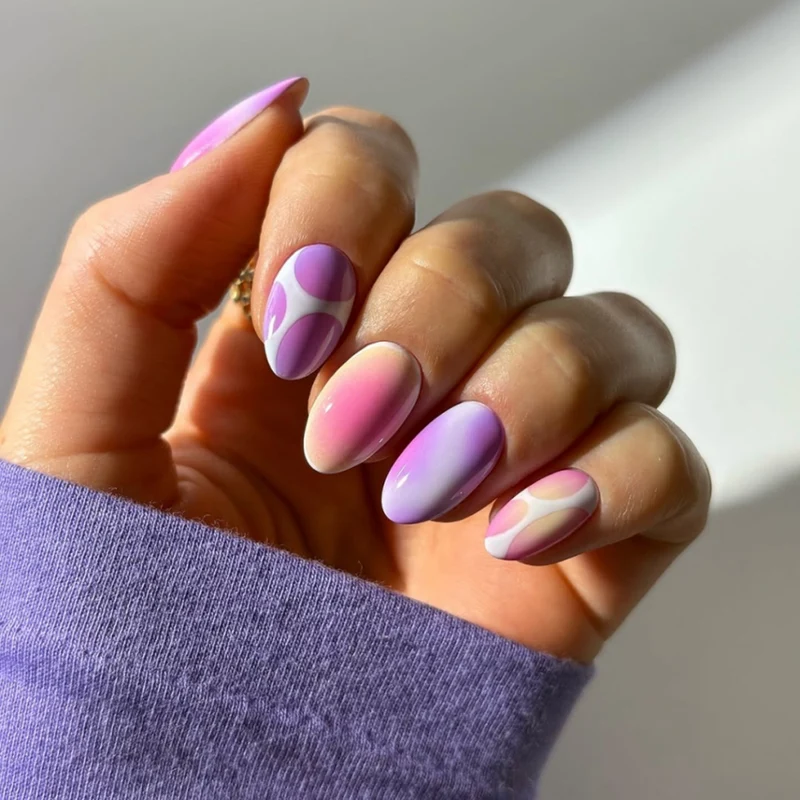 Elegant and creative nail art with a gentle gradient and geometric accents Stornfield