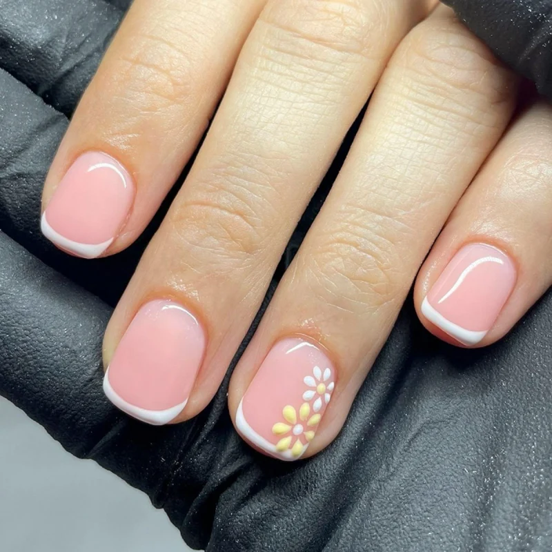 Elegant and creative nail art with floral accents Stornfield