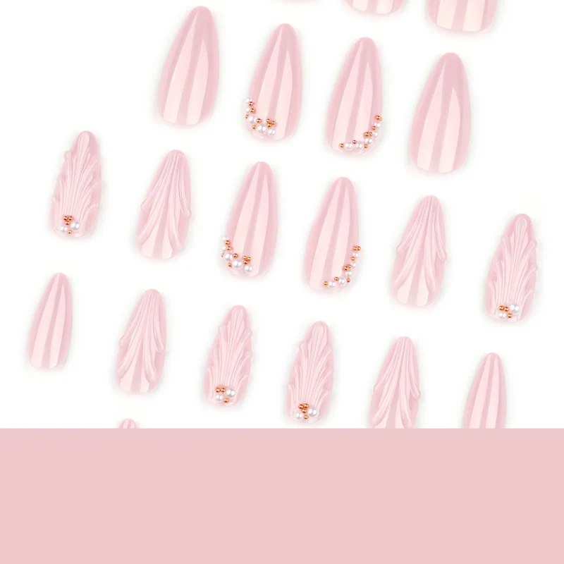 Elegant stiletto nails with shimmer design and pearl decorations Stornfield