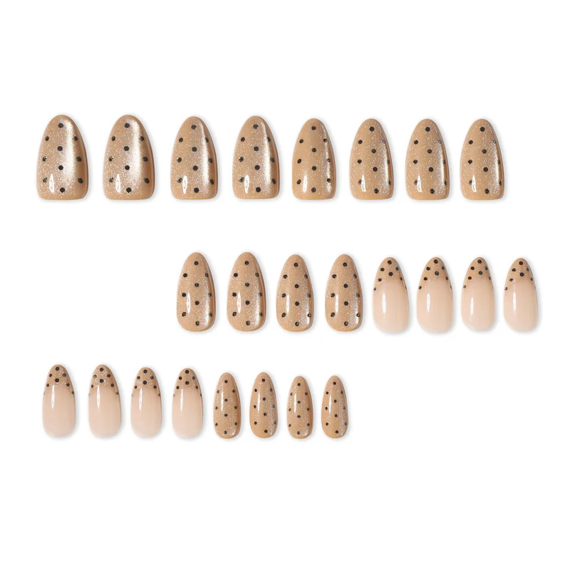 Elegant stiletto nails with glitter and dot design Stornfield