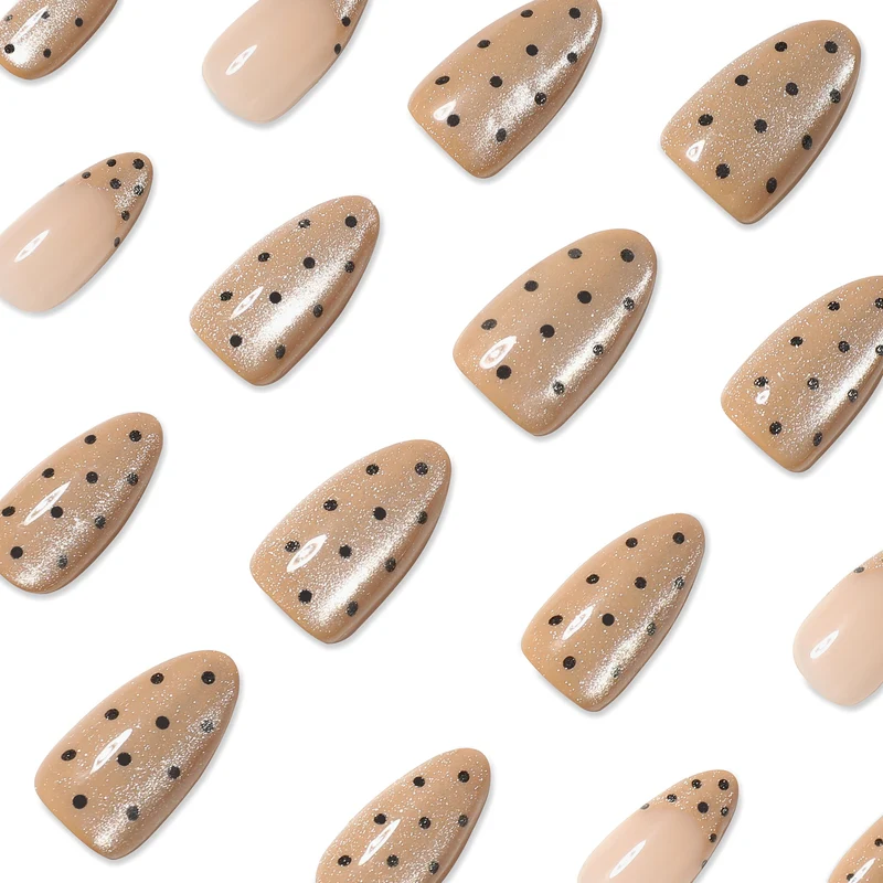 Elegant stiletto nails with glitter and dot design Stornfield
