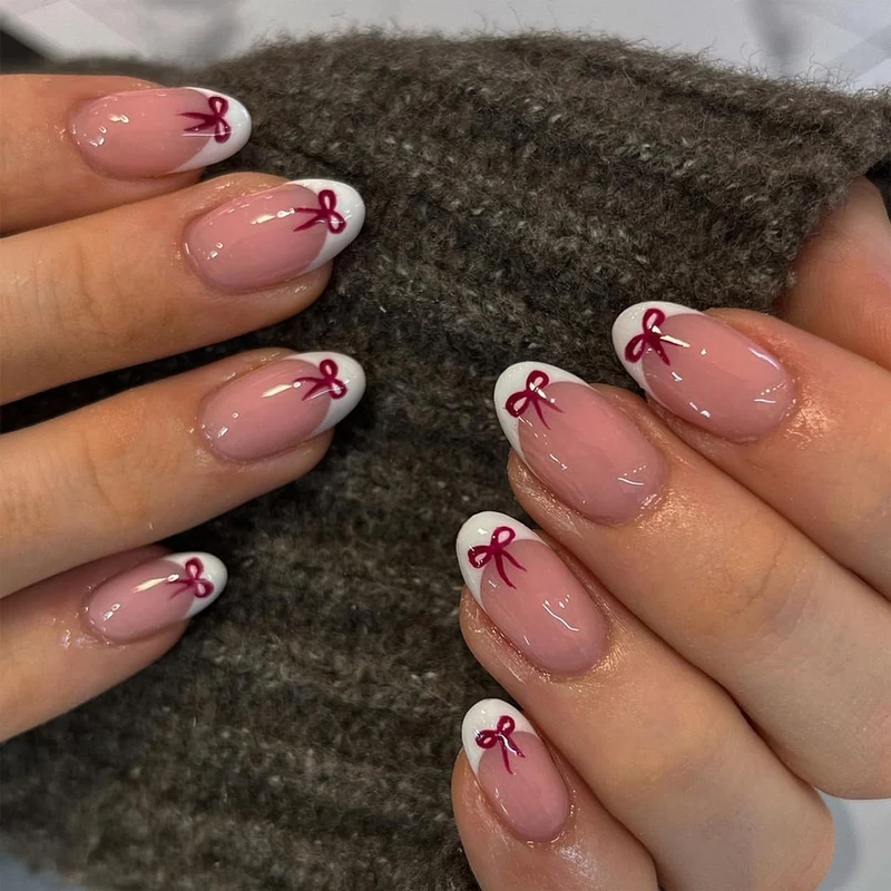 Elegant nail art with bow design Stornfield