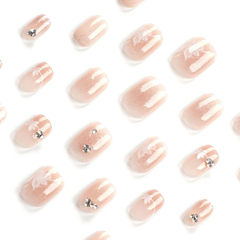 Elegant Nail Art with Holographic Accents and Floral Embellishments Stornfield