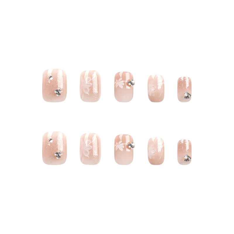 Elegant Nail Art with Holographic Accents and Floral Embellishments Stornfield
