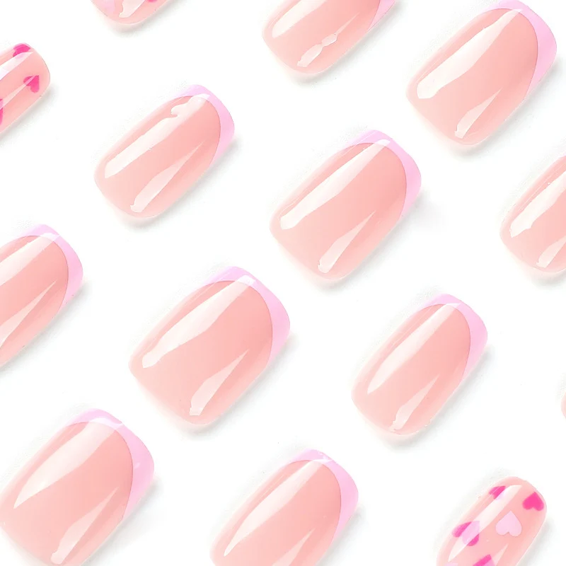 Elegant Nail Art with Heart Motifs Stornfield
